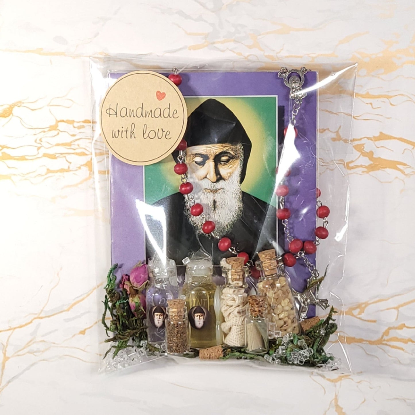 Set of oil, water, incense, soil, relic, rosary and novena booklet of Saint Charbel - Our Lady of Gifts